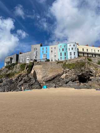 old grey houses overlooking the Castle Beach