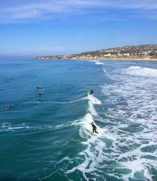 Skillful surfers at Pacific Beach