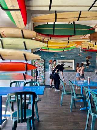 Surfers waiting in a queue at Taco Surf at Pacific Beach