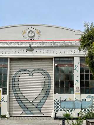 A pretty painted front of a warehouse