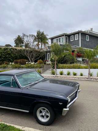 A vintage car in a pretty residential road at Bird Rock