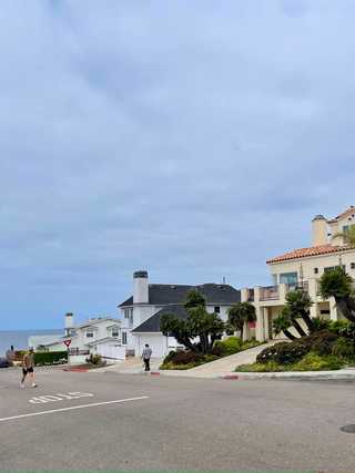 A wide residential road with ocean views at Bird Rock in San Diego