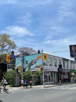 A local shopping street with people