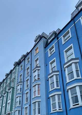 A closeup of blue apartments