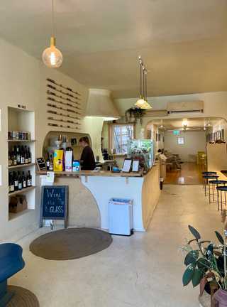 Casual coffee counter and back space at Carbonic Coffee