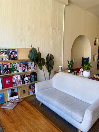 A cosy sofa corner at Carbonic Coffee