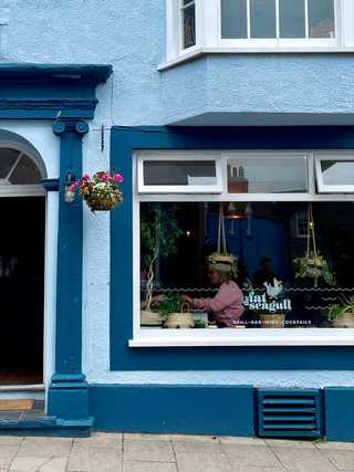 A blue restaurant facade