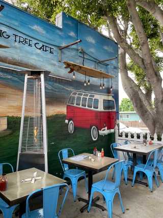 Surf themed mural at Fig Free Cafe in San Diego
