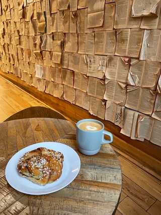Coffee and cinnamon bun at Fika