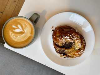 Coffee and cinnamon bun at Fika
