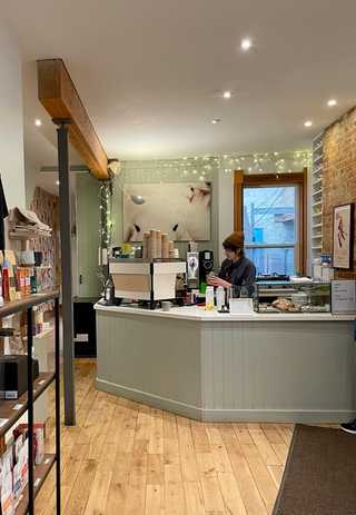 A pastel hued coffee counter at Fika
