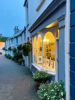A facade of a gallery in the evening