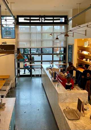 Birdeye view of the coffee counter at general Porpoise Doughnuts