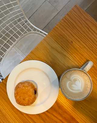 A coffee and a doughnut at General Porpoise