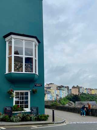 Green corner house in Tenby facing the harbour