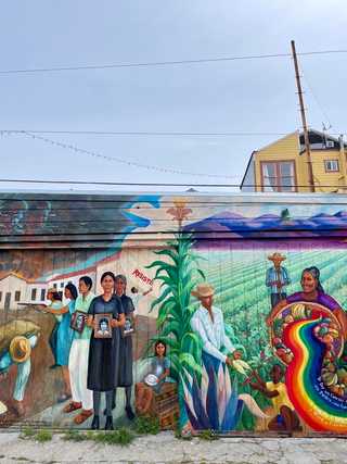 A colourful mural depicting Latin American themes