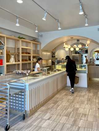 An entrance of a light filled bakery