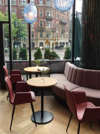An old historic Stockmann department store seen through the breakfast room windows