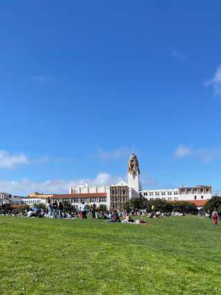 A big Latin influenced building seen from Dolores Park