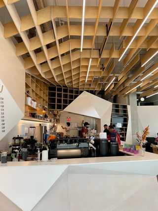 An airy, open coffee counter at Nava