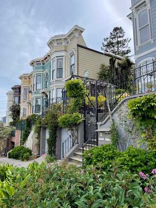 A row of pastel coloured Victorian houses in Mission