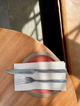 Cutlery bathing in sunlight at Tartine