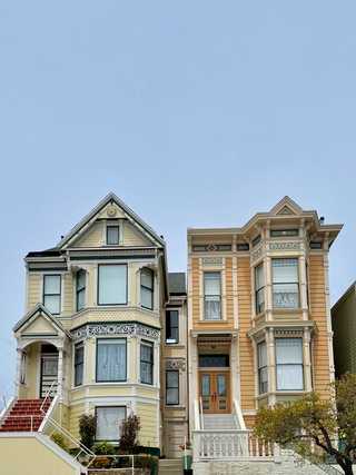 Two gorgeous wooden yellow houses in Mission